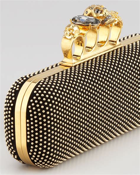 alexander mcqueen brass knuckle clutch.